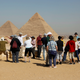 Tourists gather at the Great Pyramids of Giza, on the outskirts of Cairo, Egypt Mar. 8, just ahead of the lockdown